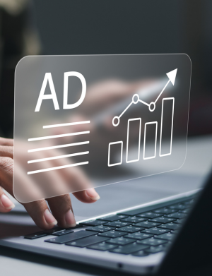 Digital advertising analytics displayed on a laptop screen, representing ad campaign performance and growth in performance marketing